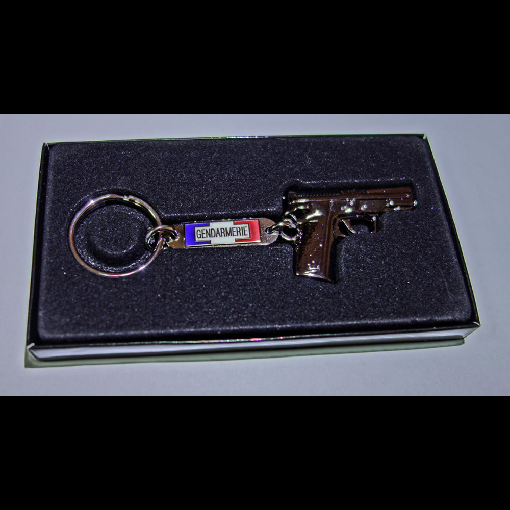 PORTE CLES PISTOLET GENDARMERIE + BOITE